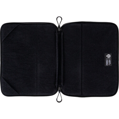 Funda para portátil WANDRD 14" Negra nylon resistente con asa integrada y soportes para laptop