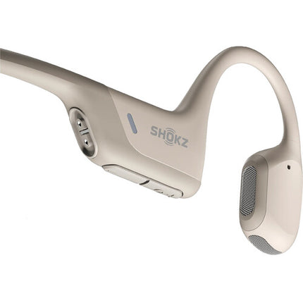 SHOKZ OpenRun Pro Auriculares Deportivos de Conducción Ósea Beige 10 Horas Reproducción IP55 Resistente
