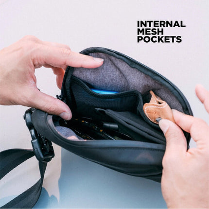Nomatic Access Sling Negro 0.5L Bolso Resistente al Agua y RFID