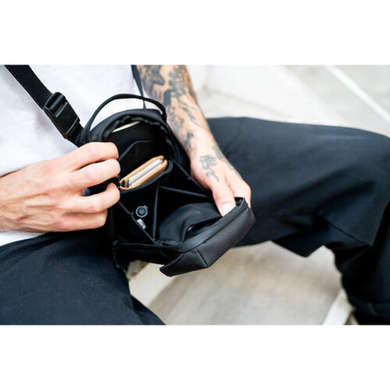 WANDRD X1 Bolso cruzado pequeño con divisor malla y correas ajustables resistente al agua