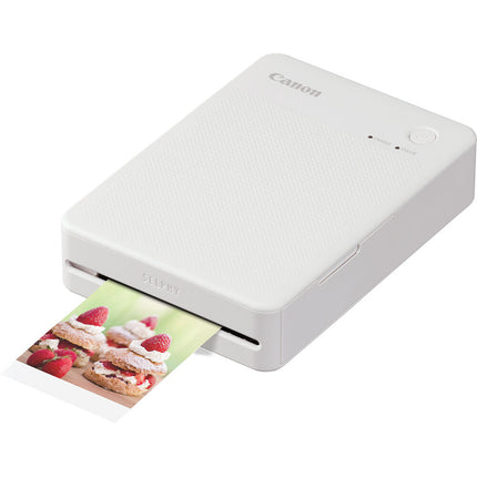 Impresora fotográfica compacta Canon SELPHY QX20 blanca con batería recargable y resolución 287 x 287 dpi