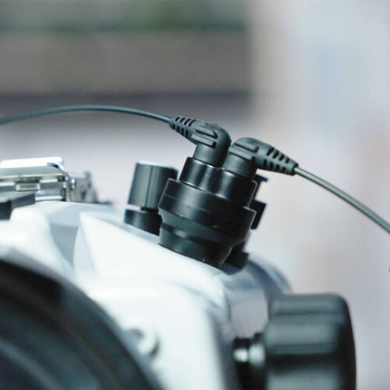 Ikelite Manual Fiber-Optic Transmisor para Disparadores de Fibra Óptica Segunda Generación con Modo Ahorro de Energía